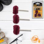 Three maroon buffing wheels with safety gear and a packaged set on a white wooden background.