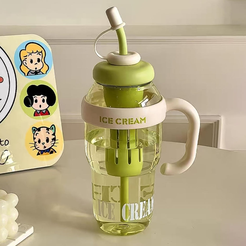 A clear plastic bottle with a green lid, straw, and handle, featuring "ICE CREAM" text.