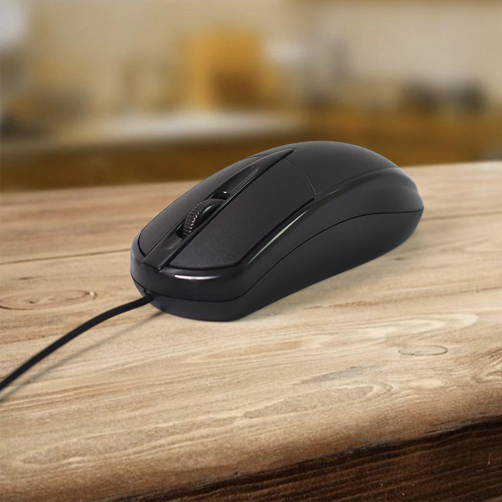 A close-up of a black wired mouse with a scroll wheel, resting on a light wooden surface.