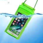 Neon green waterproof phone pouch with a phone inside, partially submerged in blue water.