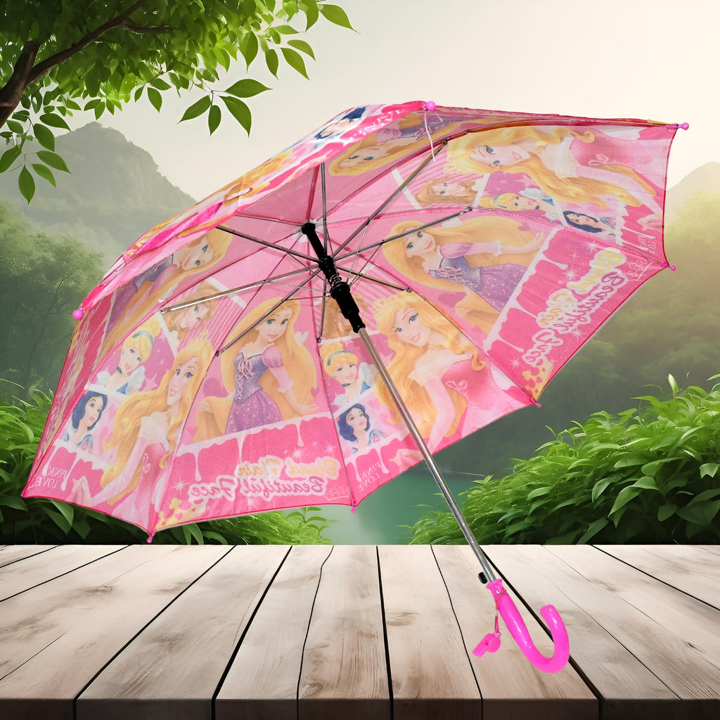 An open pink Disney Princess umbrella rests on a wooden surface with a green, natural background.