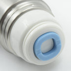 A close-up of the silver flask's white and blue cap, showing the blue ring with "CLOSE" text.