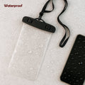 A clear mobile pouch and a phone covered in water droplets, with a black neck strap and a red droplet logo on the pouch.