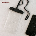 A clear mobile pouch and a phone covered in water droplets, with a black neck strap and a red droplet logo on the pouch.