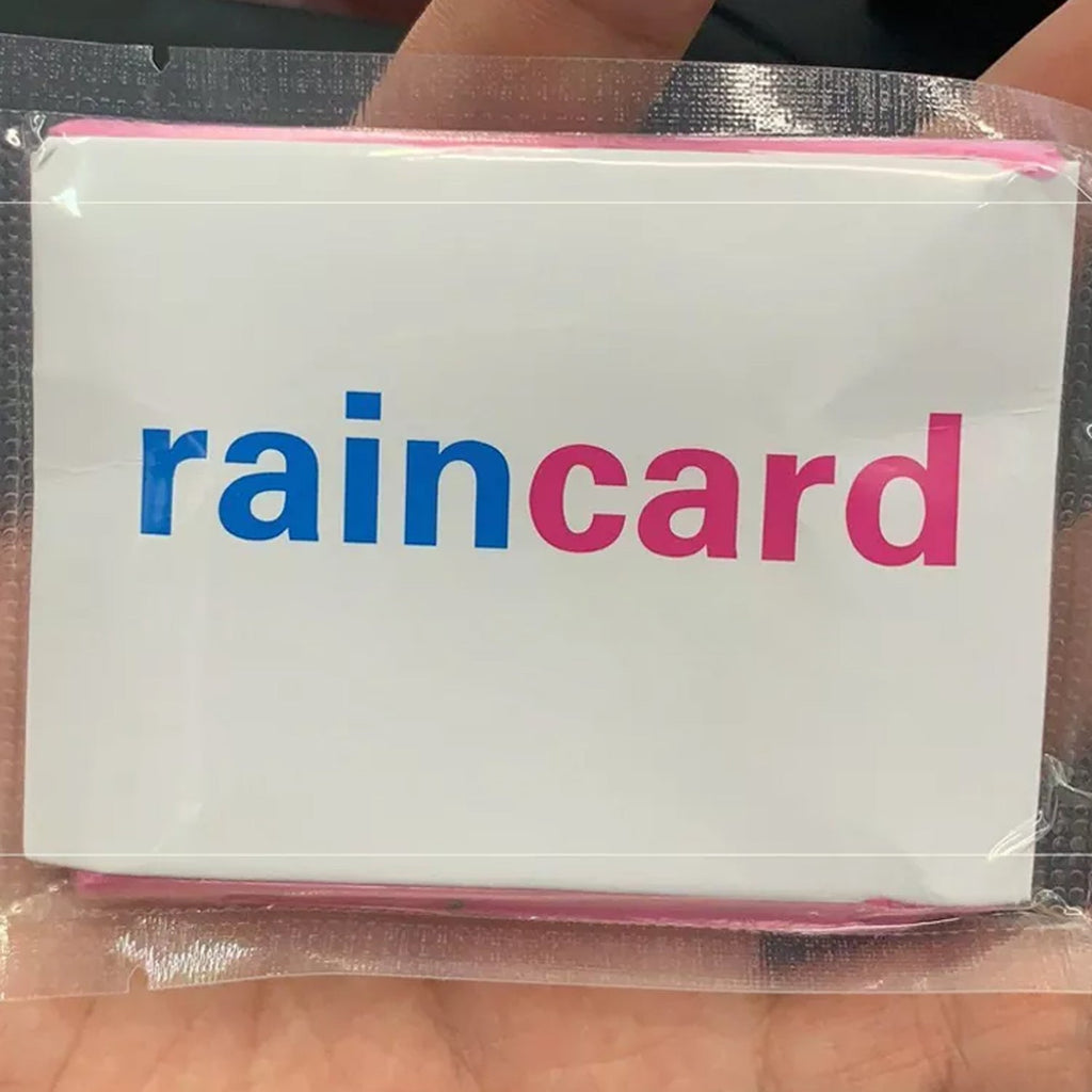A hand holding a 'raincard' in a clear plastic sleeve, showing the blue and pink logo.