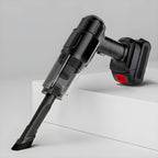 Black handheld vacuum cleaner with a brush attachment, angled downwards on a white stepped surface.