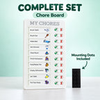 A white chore board with all tasks marked incomplete, next to a black rectangular mounting dot accessory.