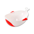 A white whale-shaped rice drainer bowl with red fins and tail on a white background.