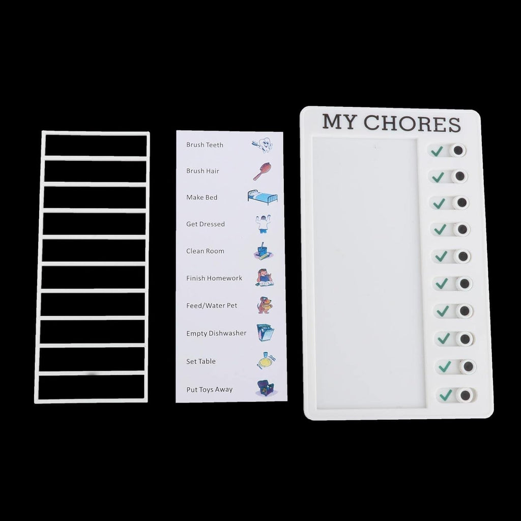 A white plastic frame, a sheet of chore icons, and the 'MY CHORES' board with green checkmarks, all on a black background.