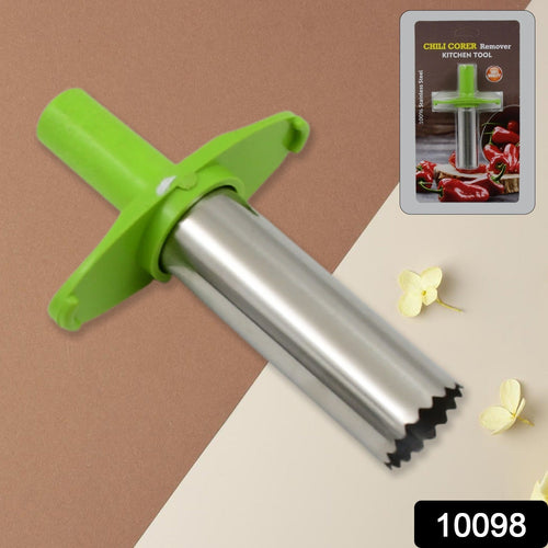A green and silver chili corer is displayed on a two-tone brown and beige background with its retail packaging.