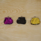 Sequined coin purse keychain showing the keyring attachment