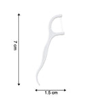 A white dental floss pick is shown with dimensions: 7 cm in length and 1.5 cm in width.
