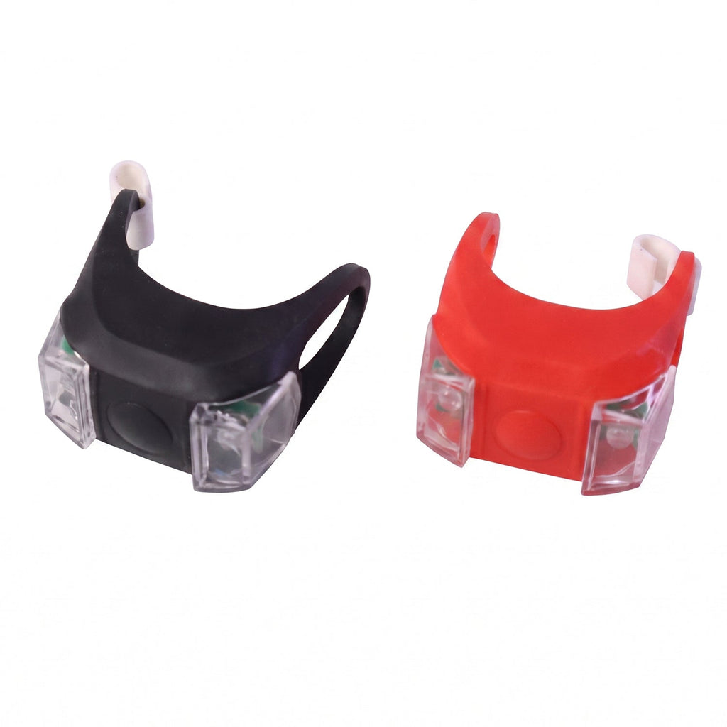 Silicone LED bike light pair on white background