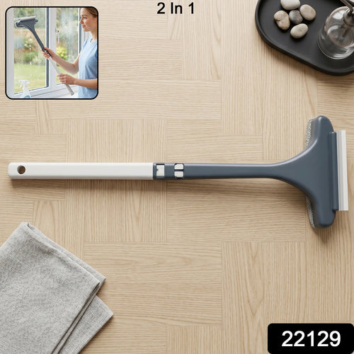 2 in 1 glass cleaner with scrubber and squeegee on a glass surface