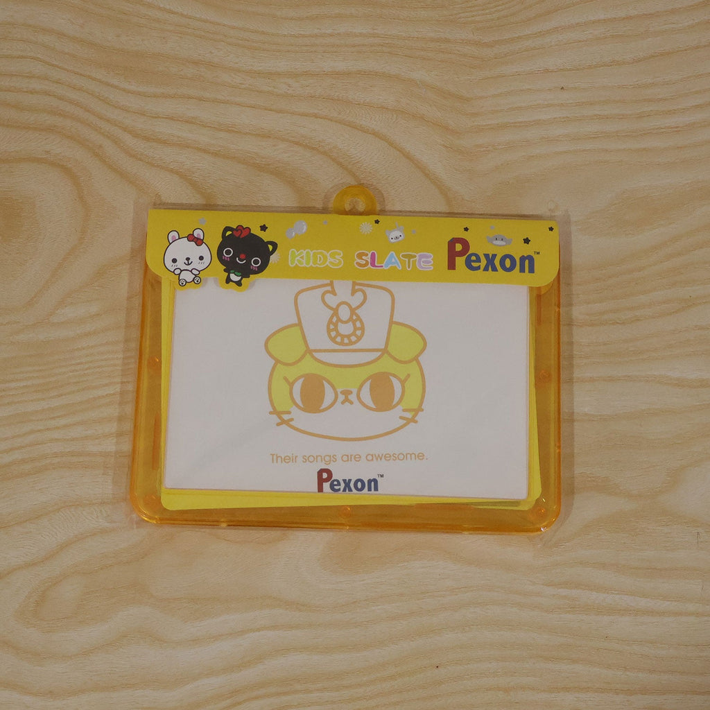 A yellow-framed Pexon writing board in clear plastic packaging, featuring a cartoon cat design on a wooden surface.
