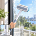 A hand holds a gray and white window cleaning tool against a sudsy window, with a small product image.