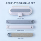 The cleaning set disassembled, showing the head, two handle pieces, and a separate detail brush on a blue surface.