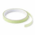 Fluorescent glow tape roll on white background