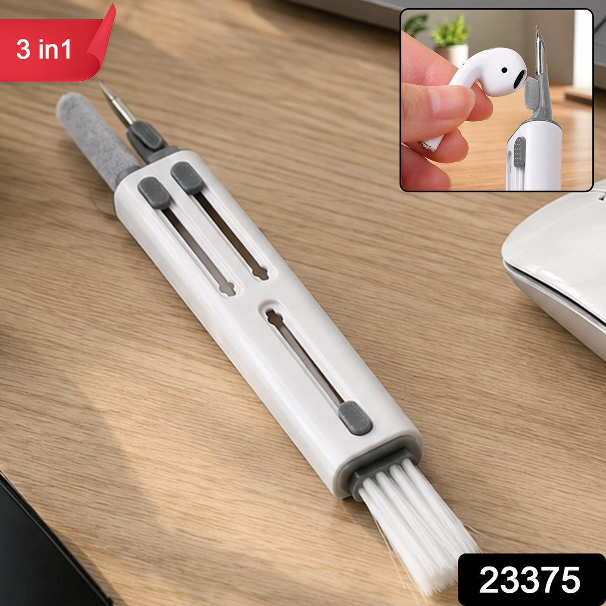 White and gray multi-tool cleaning pen on a wooden desk with a small inset image showing its use.