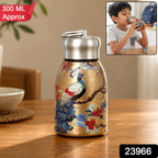 Golden stainless steel vacuum bottle with a peacock and floral print, showing 300 ML Approx and product number 23966.
