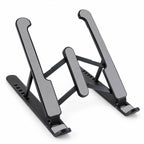 A black and gray adjustable laptop stand is shown unfolded, ready for use, against a white background.
