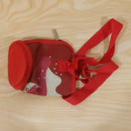 Stylish and functional water bottle carrier sling for outdoor and travel needs