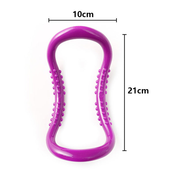 A purple pilates ring with textured bumps, showing dimensions of 10cm width and 21cm height.