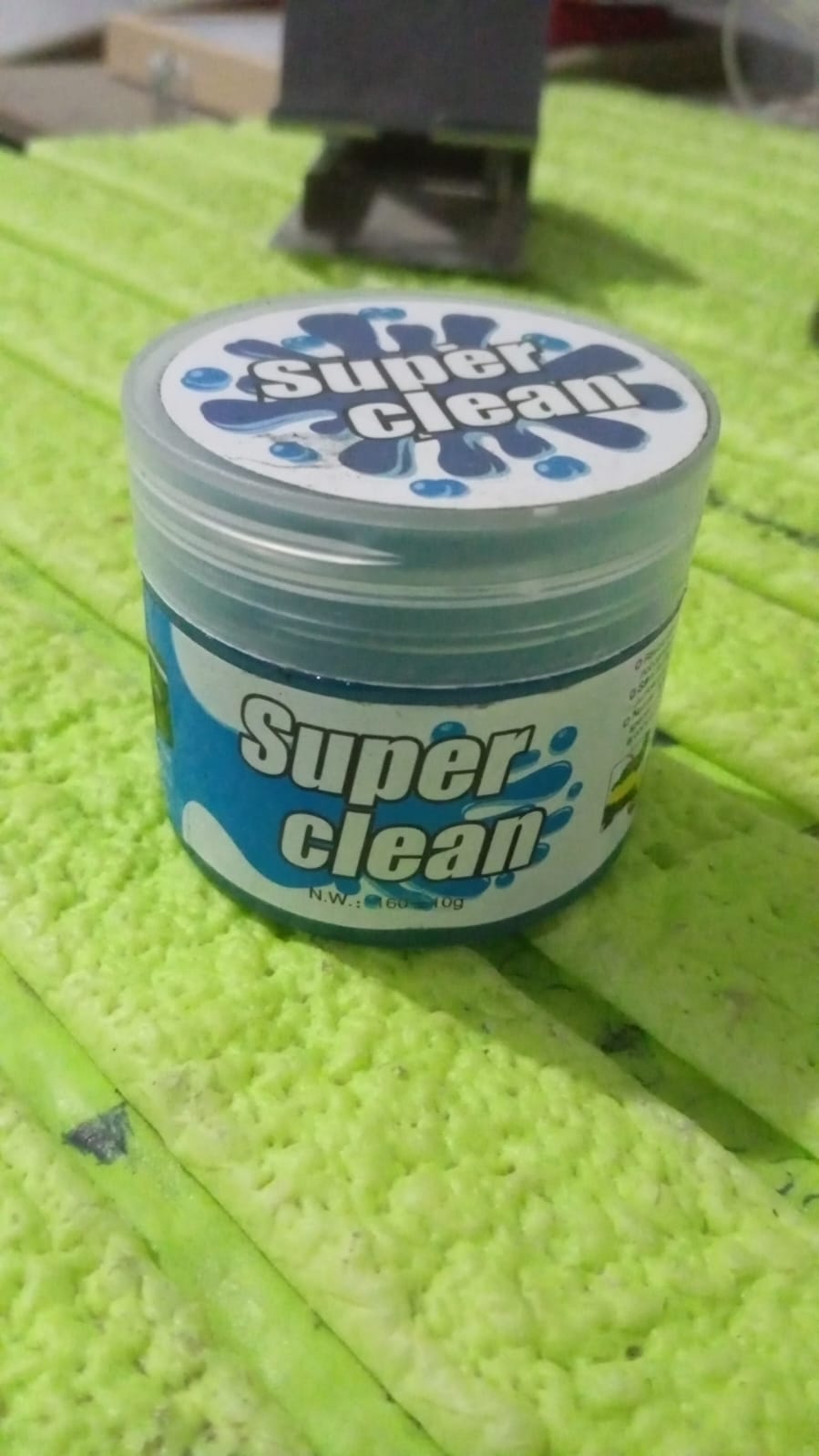 Velvet Wipe blue gel multi-surface cleaning compound demonstrating its ability to lift dirt without leaving residue.