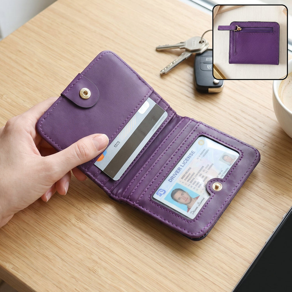 A hand holds an open purple bifold wallet with a credit card and driver's license inside, on a wooden table with keys