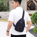 A man wearing a black sling bag across his chest, with a smaller inset image of the bag.