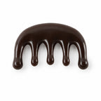 A dark brown resin scalp massager with five rounded prongs is centered on a plain white background.