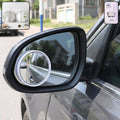 A round blind spot mirror attached to a car's side mirror, with two similar mirrors in an inset.