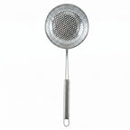 A single stainless steel perforated skimmer spoon with a long handle on a plain white background.