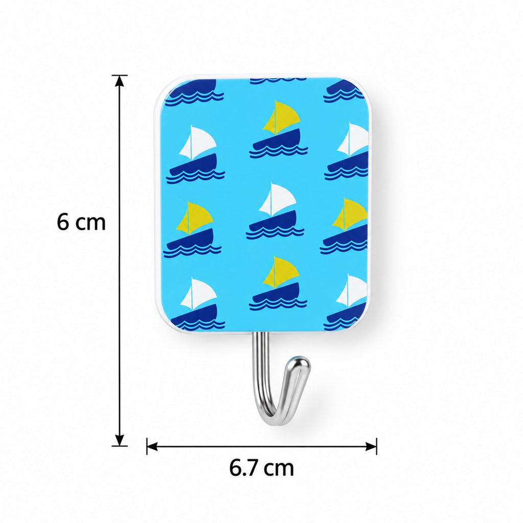 A single blue hook with a sailboat pattern, showing its dimensions of 6 cm in height and 6.7 cm in width.