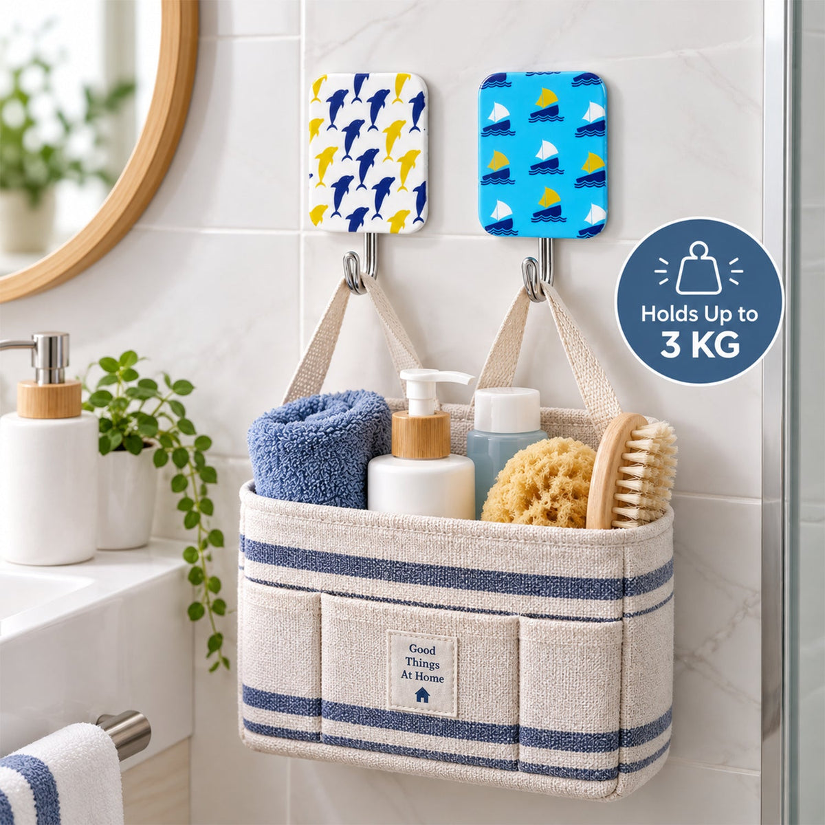 Two decorative hooks on a tiled bathroom wall, supporting a striped fabric caddy filled with toiletries.
