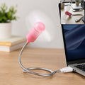 Pink USB mini fan with white blades plugged into a laptop, with a smaller inset image showing the same fan.