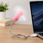 Pink USB mini fan with white blades plugged into a laptop, with a smaller inset image showing the fan from above.