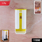 A white and yellow plastic bag dispenser is mounted on a pinkish-brown textured wall.