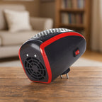 Side view of the black and red heater, showing the plug, power switch, and fan grill.