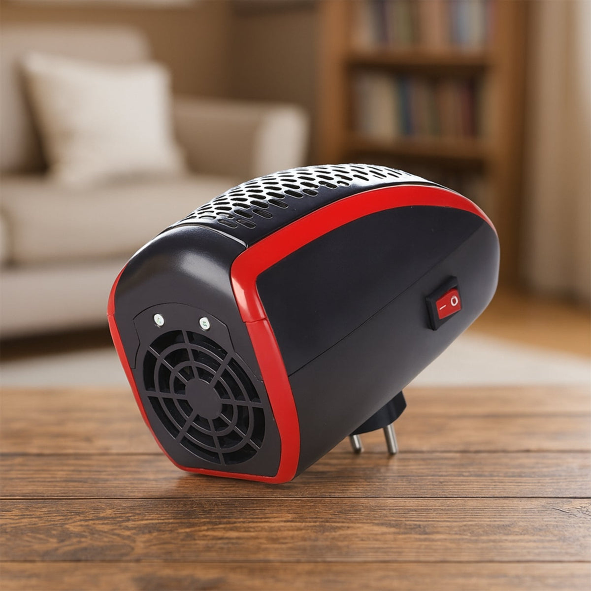 Side view of the black and red heater, showing the plug, power switch, and fan grill.